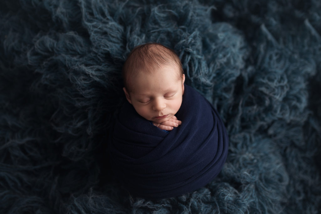 newborn baby photo on blue fur pittsburgh photographer newborn photography session